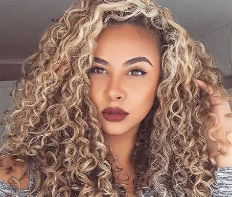 blonde highlights on curly black hair